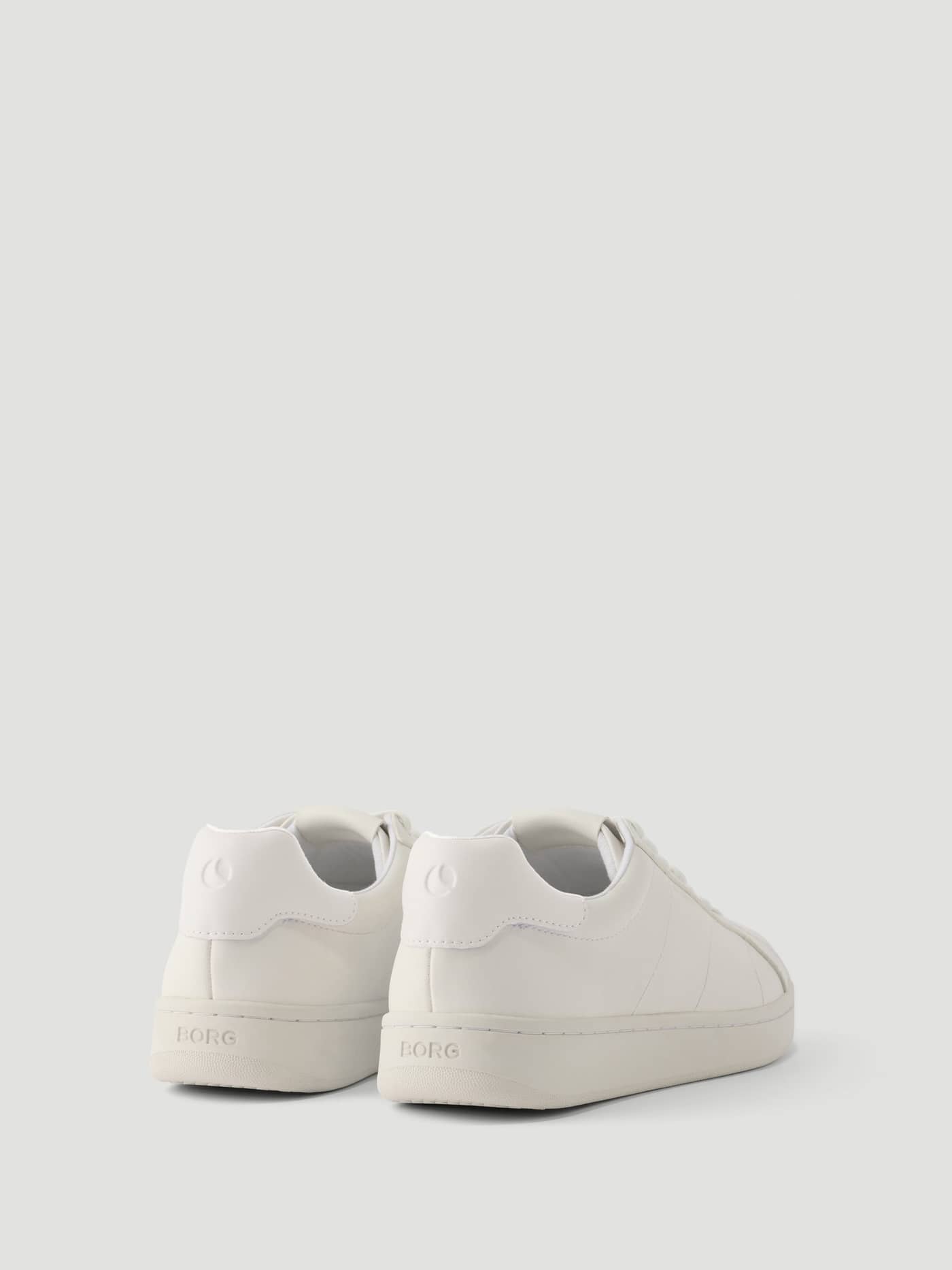 Back view of the Unisex Deuce Sneakers in White (White) showing the heel and midsole branding. - Image 2