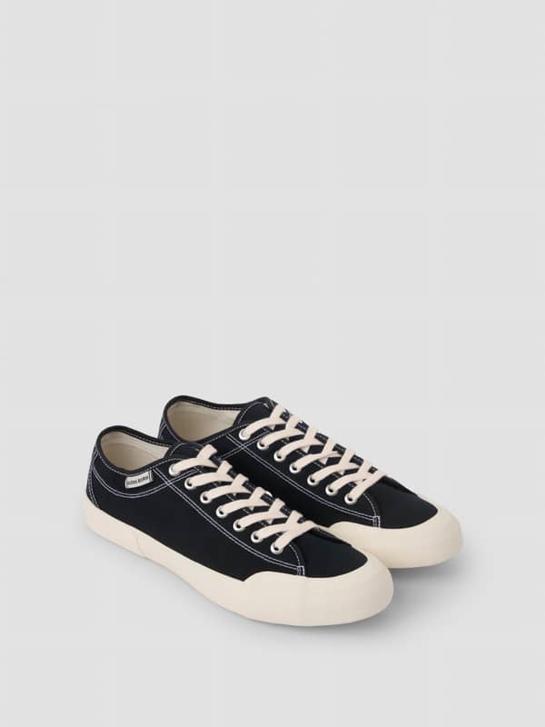 Unisex Smash Sneakers en toile de coton noir avec lacets et logo blancs pour le tennis.