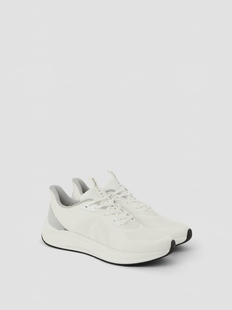 Unisex Ace Knit Sneakers en blanc pour le running, avec une tige tricotée flexible et des logos BORG gris.