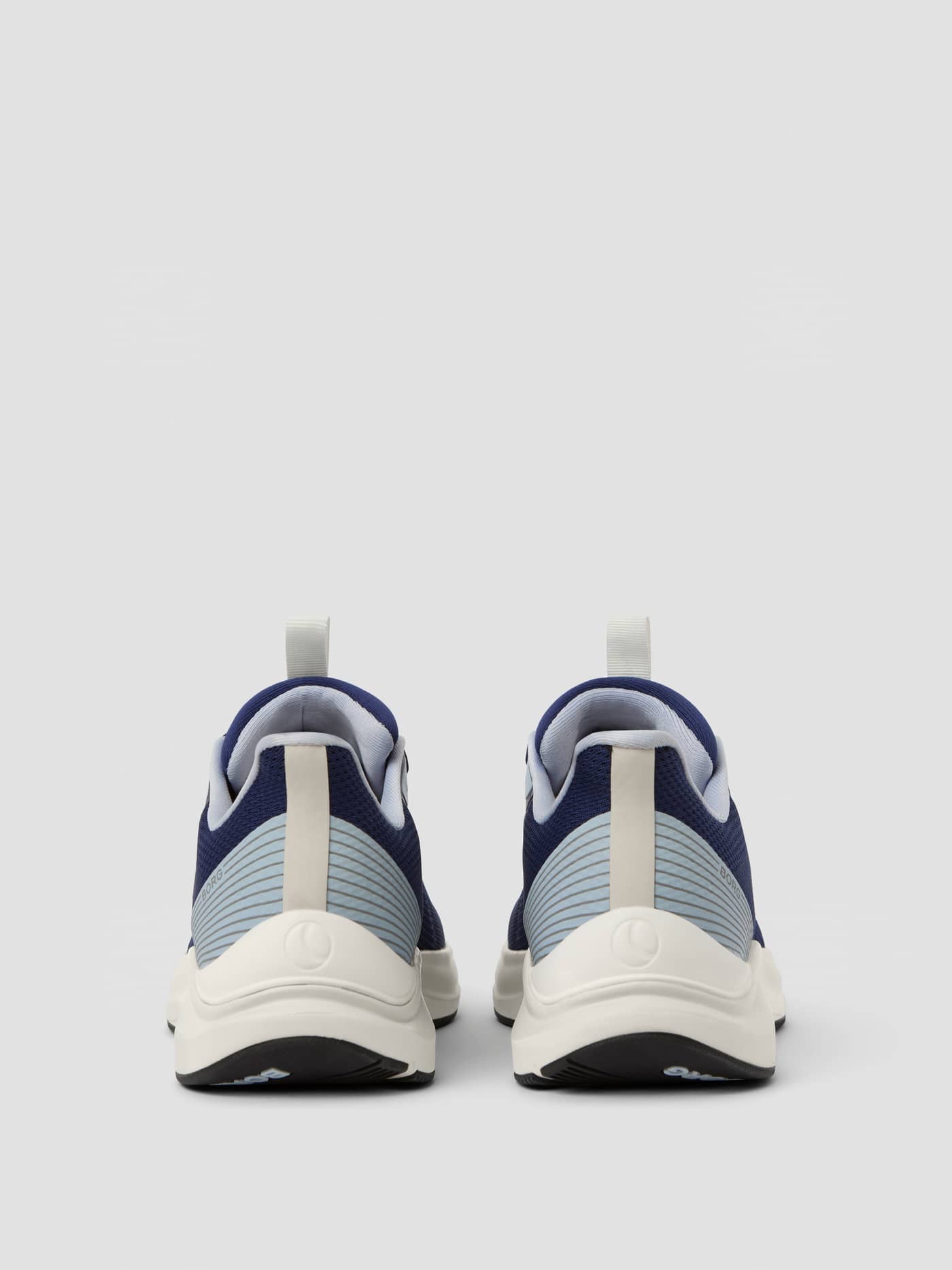 Back view of the Björn Borg Unisex Ace Knit Sneakers in Navy, featuring a flexible knit upper for running. - Image 3