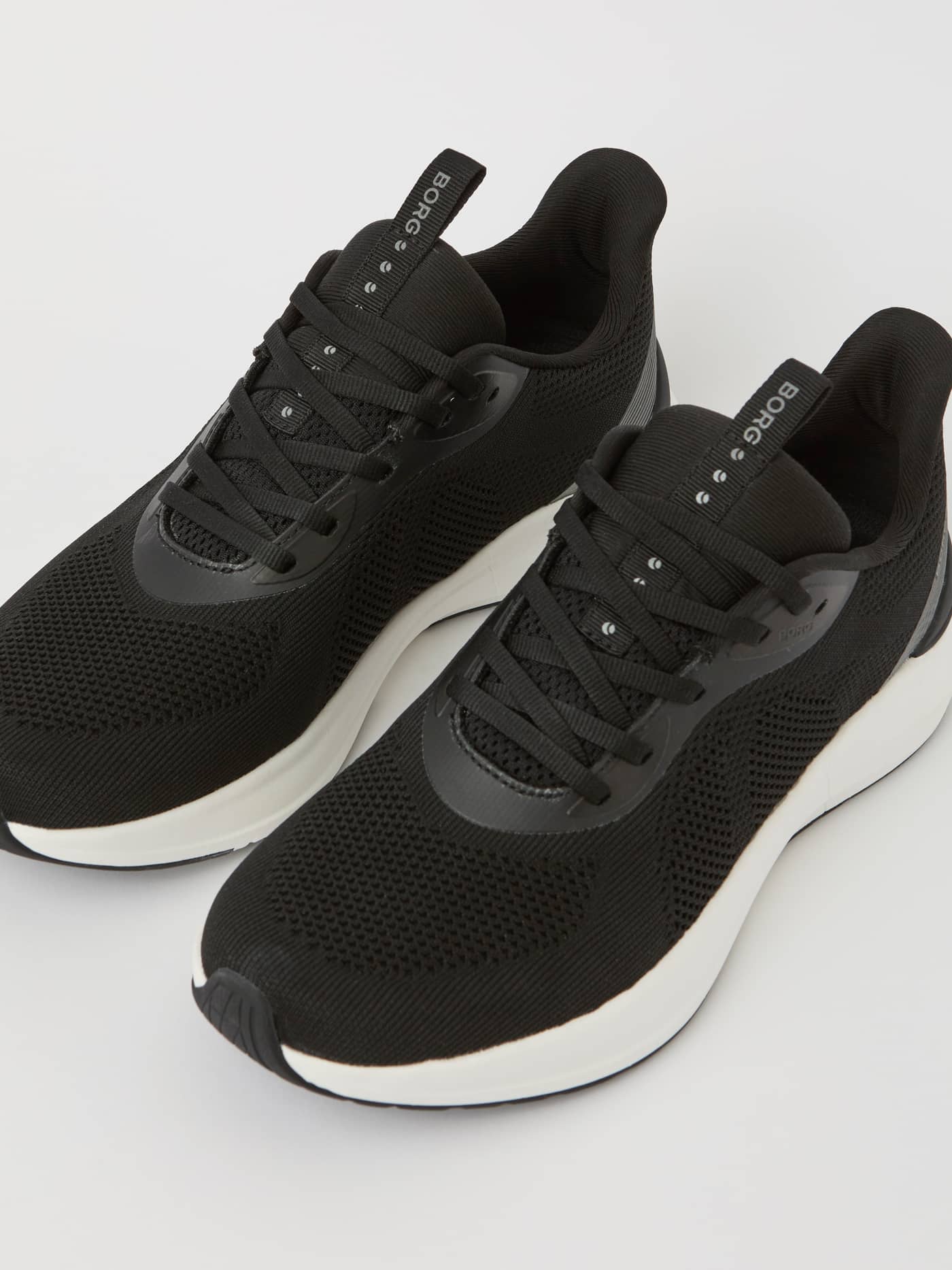 Black Unisex Ace Knit Sneakers for running and tennis, featuring a flexible knit upper and a white BORG logo. - Image 2