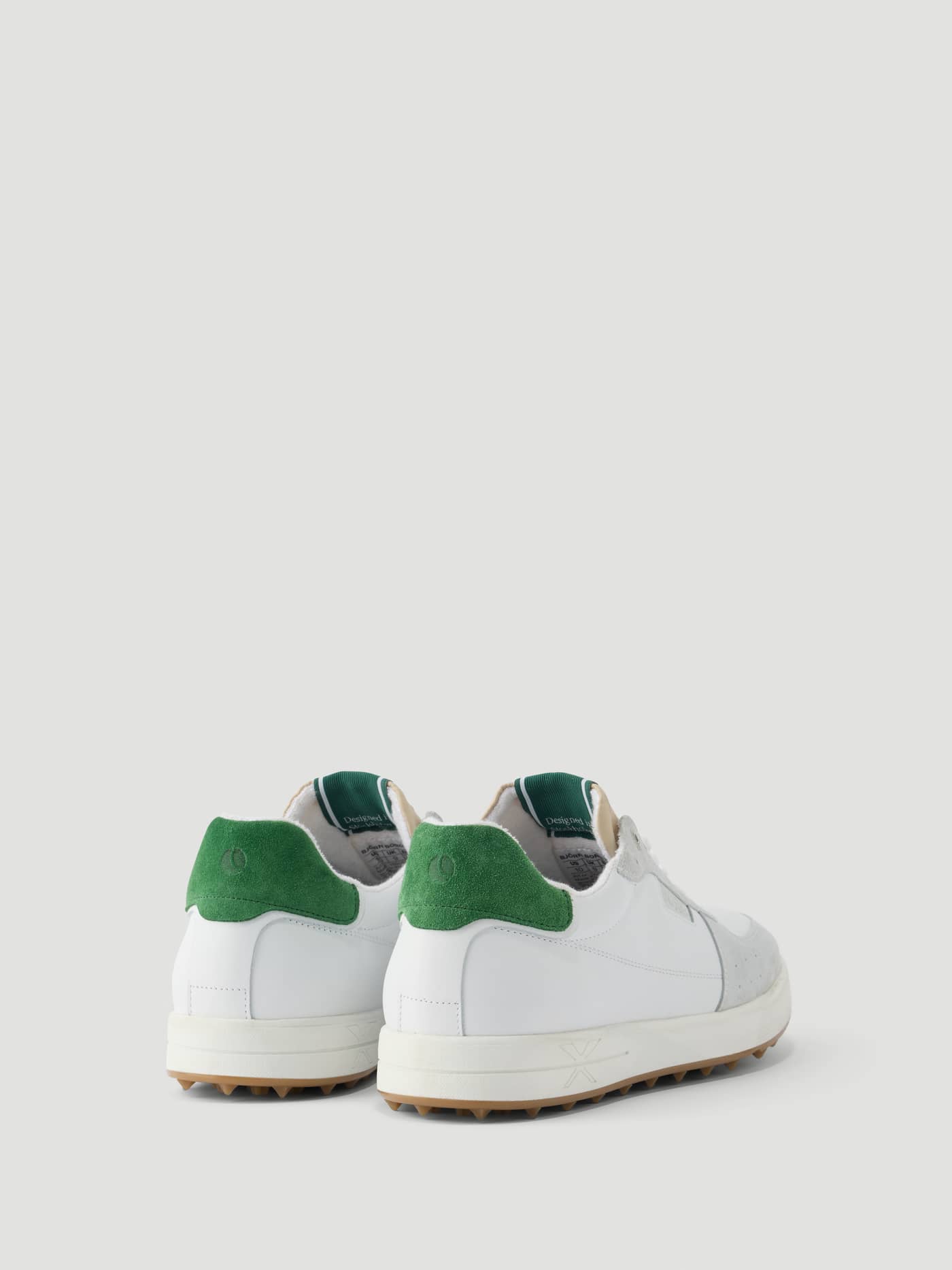 Back view of the leather Men's Baseline Golf Sneakers in White and Green, built for golf and tennis performance. - Image 5
