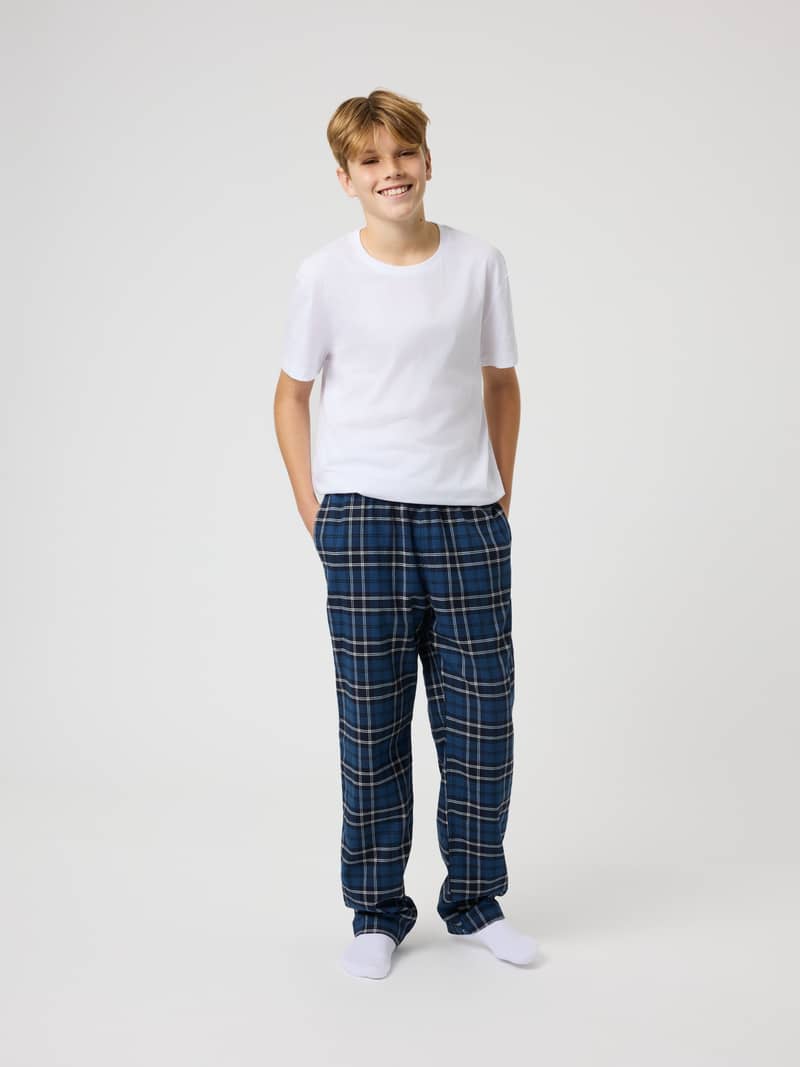Front view of kids Björn Borg Core Flannel Pyjama Pants in Forest Tartan 4 (Green) with a classic check pattern.