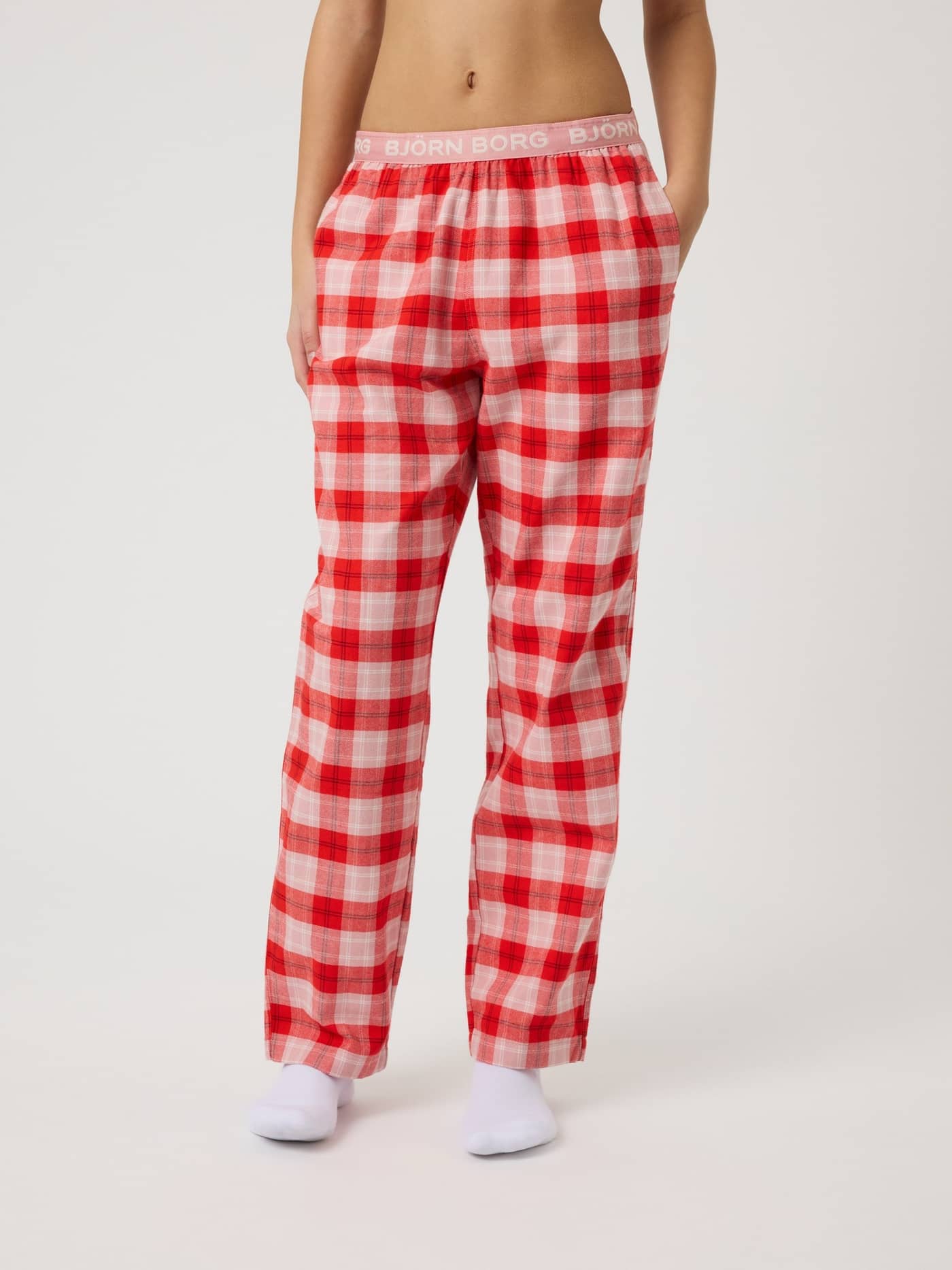 Front view of kids Core Flannel Pyjama Pants in a pink, red, and white tartan pattern with soft brushed flannel. - Image 2