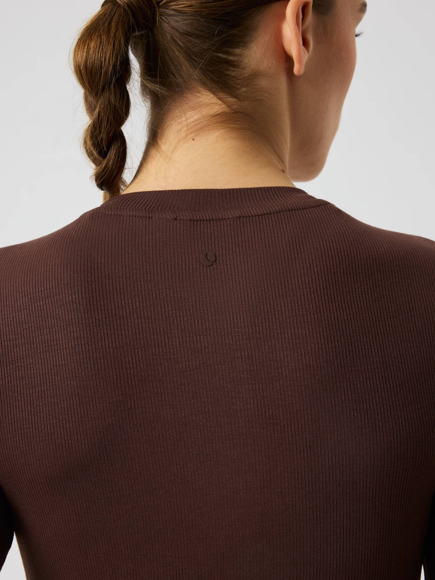 Studio Ribbed Cropped Long Sleeve in Coffee Bean (Brown) featuring a tonal tennis ball print at the back neck for training. - Image 5