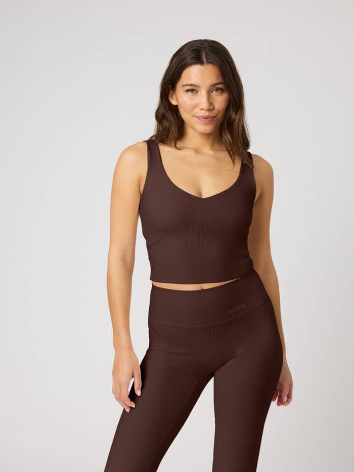 Front view of the Studio Ribbed V-Neck Top in Coffee Bean (Brown), a slim cropped tank for women's training.