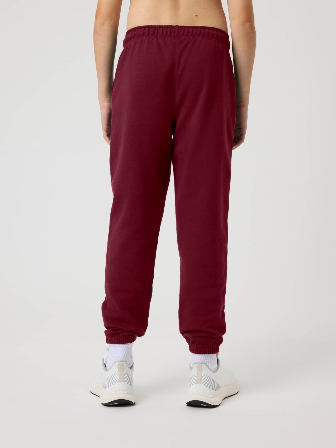 Back view of the Borg Classic Sweatpants in Cabernet (Red), showcasing the relaxed fit and elastic waistband. - Image 3