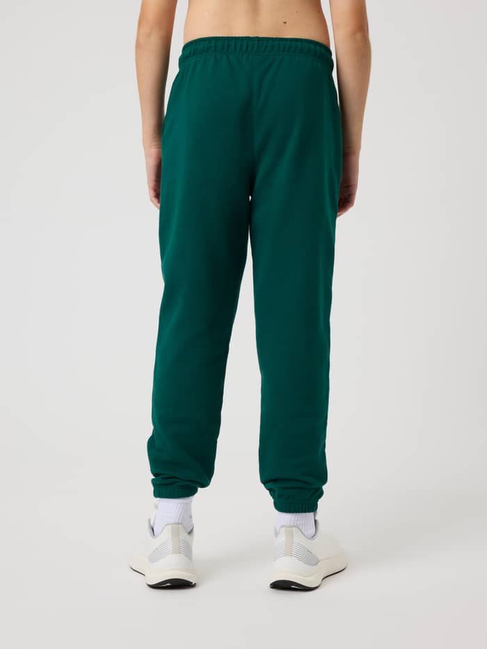 Back view of Borg Classic Sweatpants for kids in Rain Forest (Green) featuring a soft, relaxed fit for all-day comfort. - Image 2