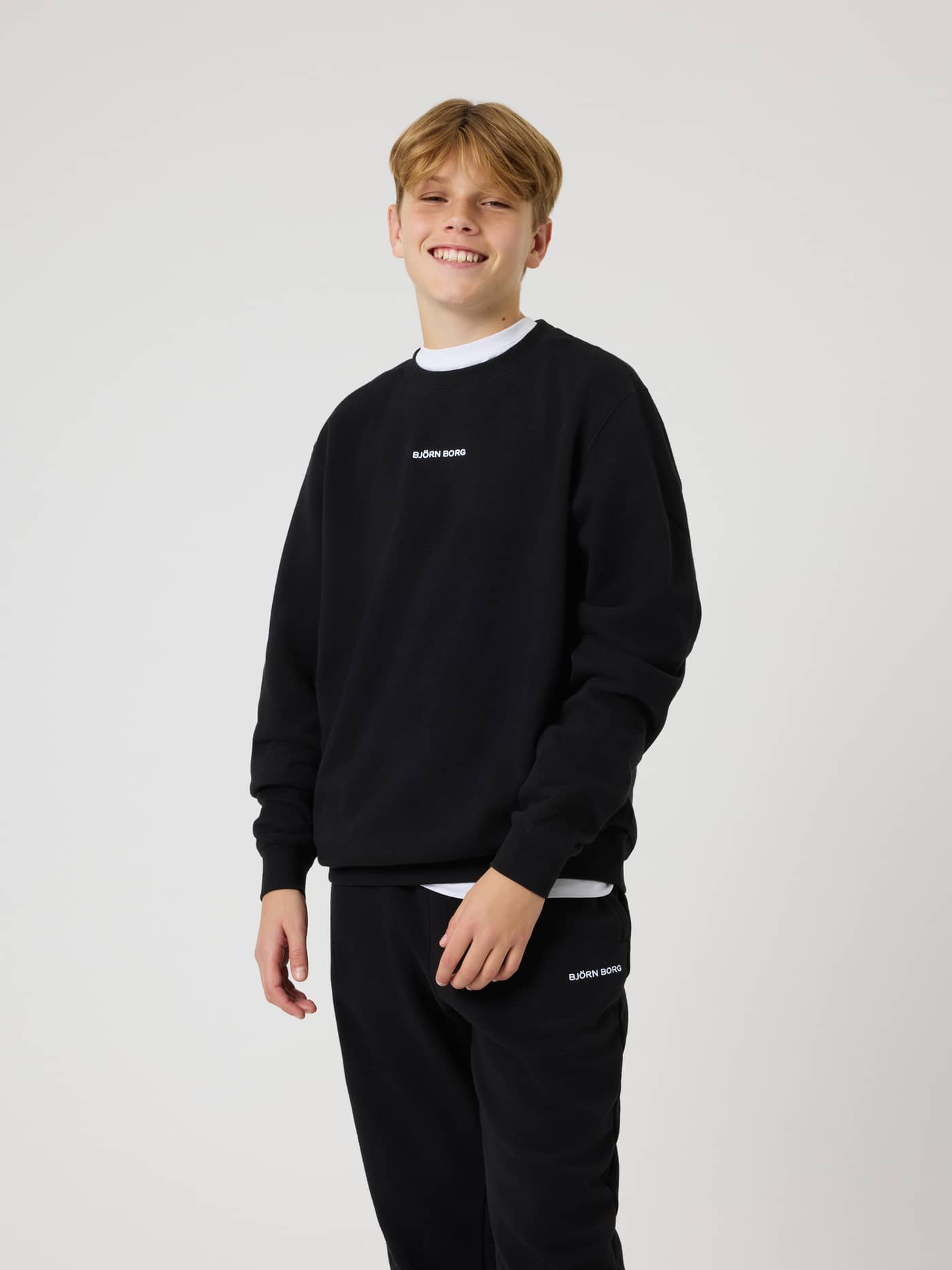 Front view of the kids' Borg Classic Sweatshirt in Black Beauty (Black) with a white Björn Borg chest logo. - Image 1