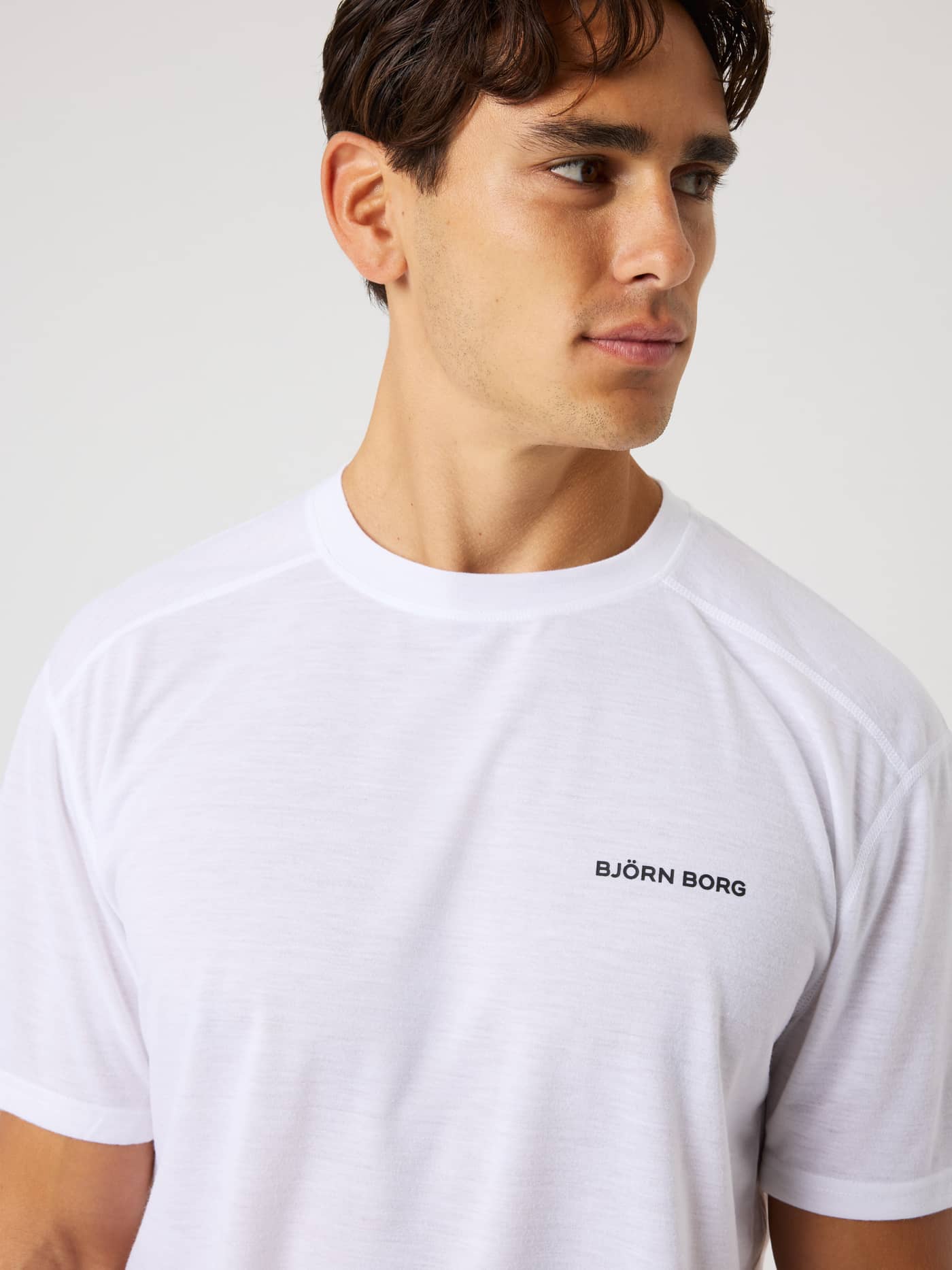 Borg Soft Sports T-Shirt in Brilliant White (White) with a black chest logo, ideal for training or tennis sessions. - Image 5