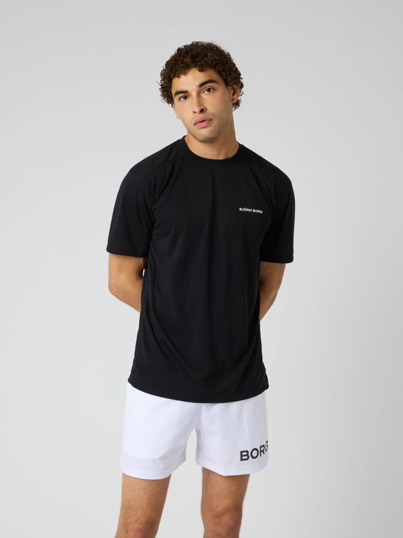 Front view of the Borg Soft Sports T-Shirt in Black Beauty (Black) for training, featuring a white logo on the chest. - Image 2