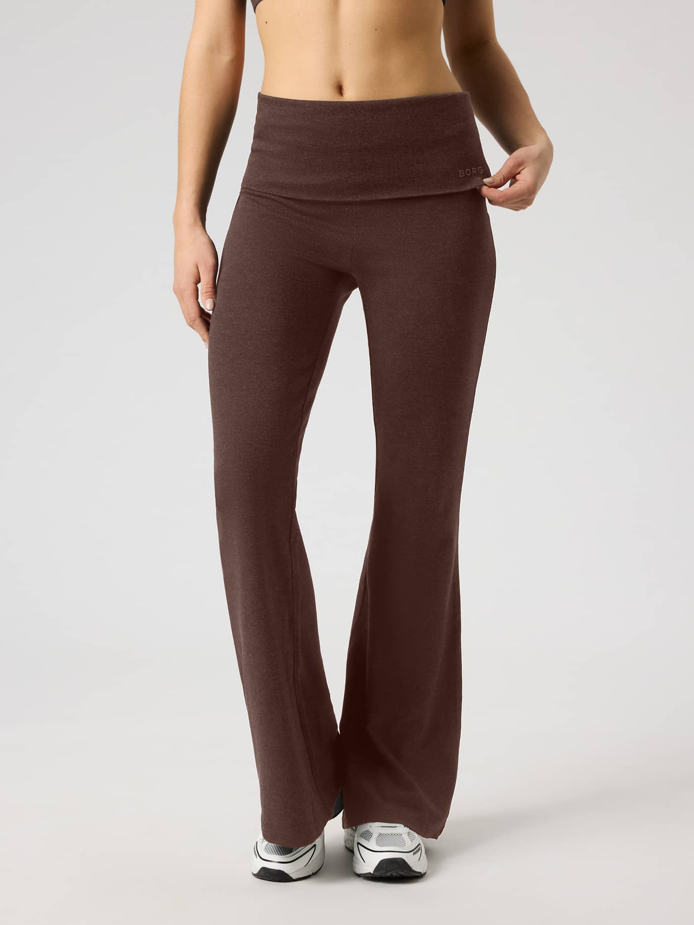 Studio Flow Folded Flare Tights in Coffee Bean (Brown) for training with a flared leg and a brown logo on the waistband. - Image 2