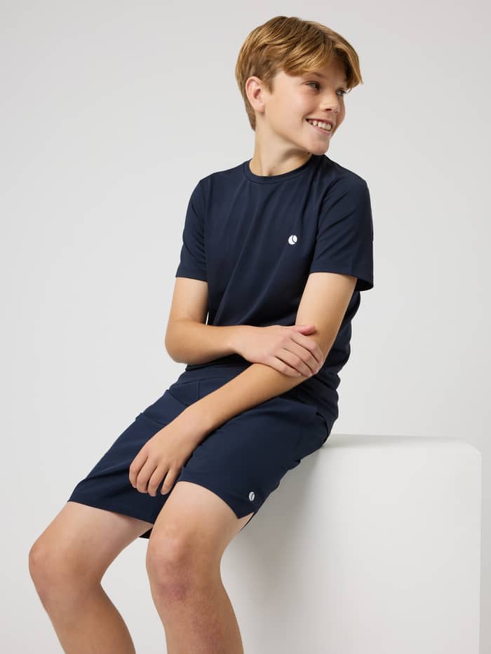 Kids Ace Slim T-Shirt in Night Sky (Navy) with a white tennis logo and a slim fit for performance on the court.