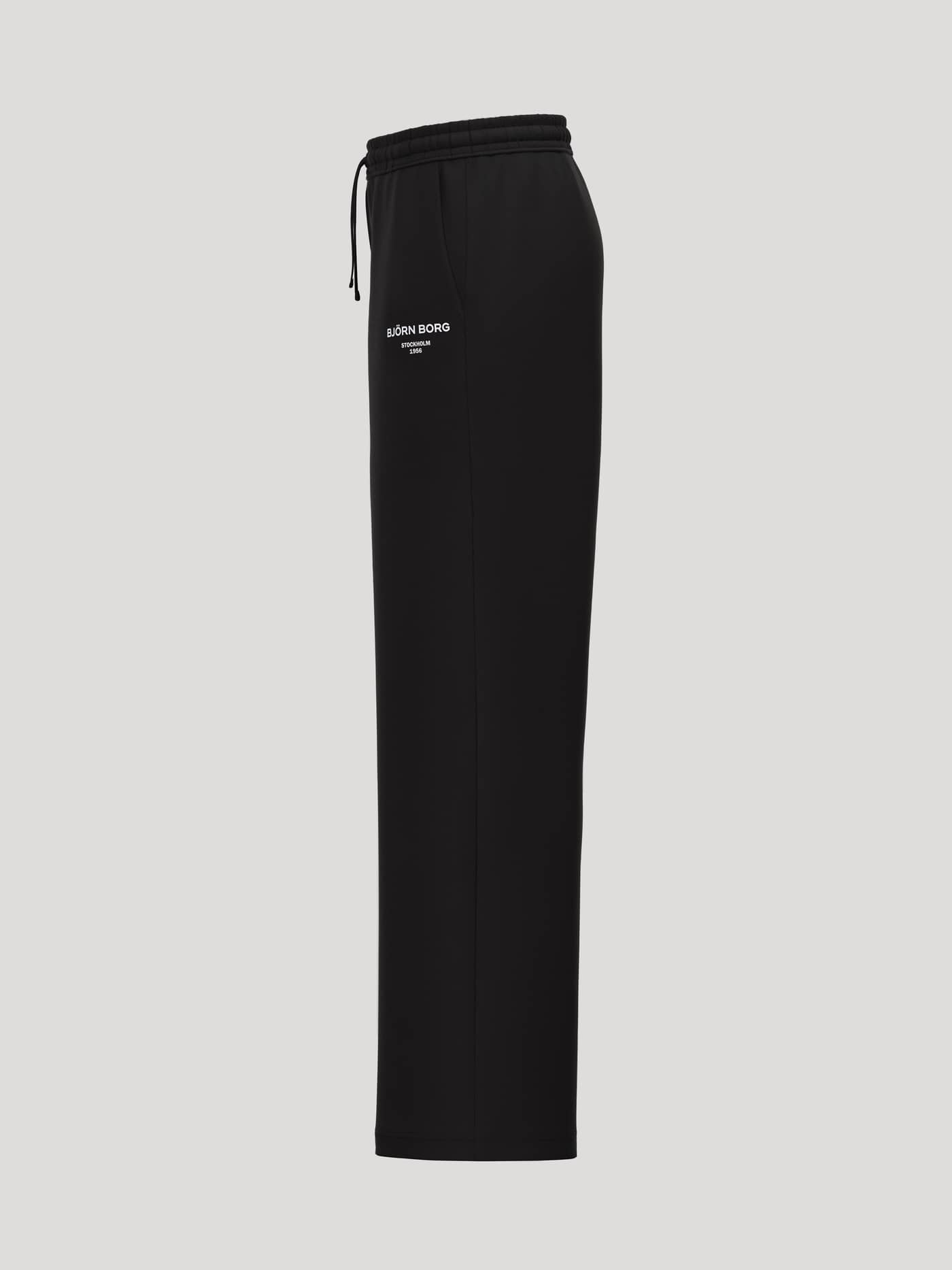 Side view of the Borg Essential 1 Straight Sweatpants in Black Beauty (Black) with a straight fit and white logo detail. - Image 3