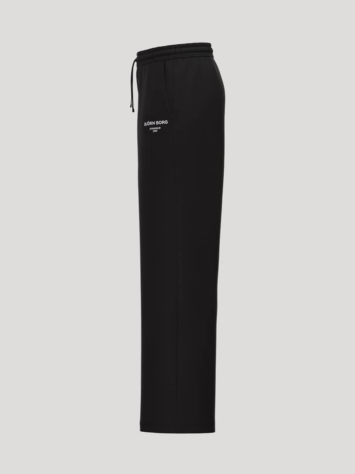 Zijaanzicht van de Borg Essential 1 Straight Sweatpants in Black Beauty (Zwart) met een rechte pasvorm en wit logodetail. - Image 3
