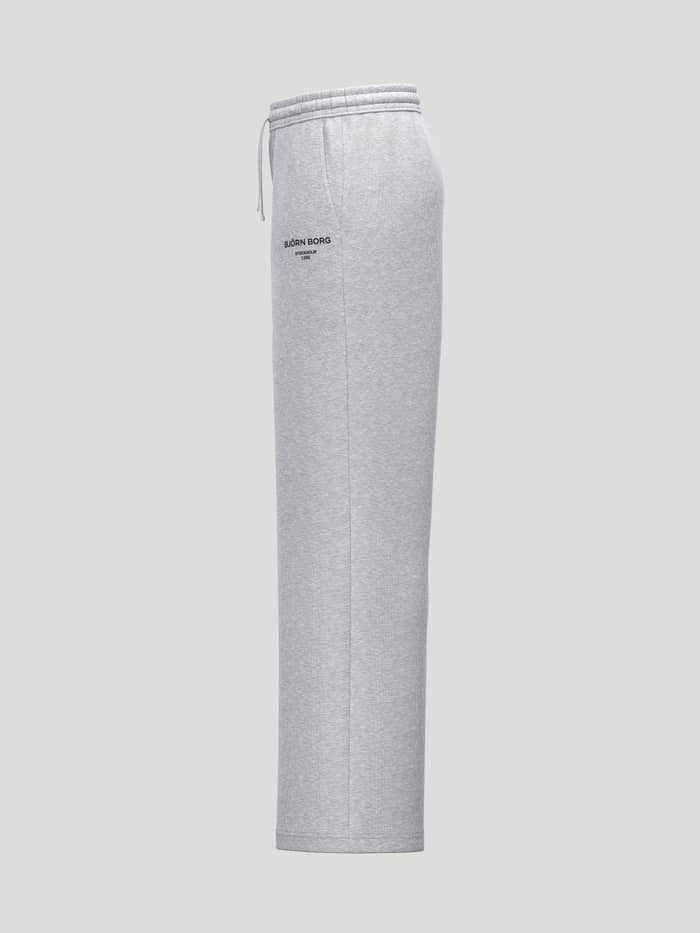 Zijaanzicht van de Borg Essential 1 Straight Sweatpants in Light Grey Melange (Grijs) met een zwart logo. - Image 3