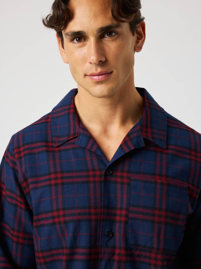 Close-up of the Core Flannel Pyjama Shirt in blue and red tartan plaid pattern featuring soft brushed cotton flannel.