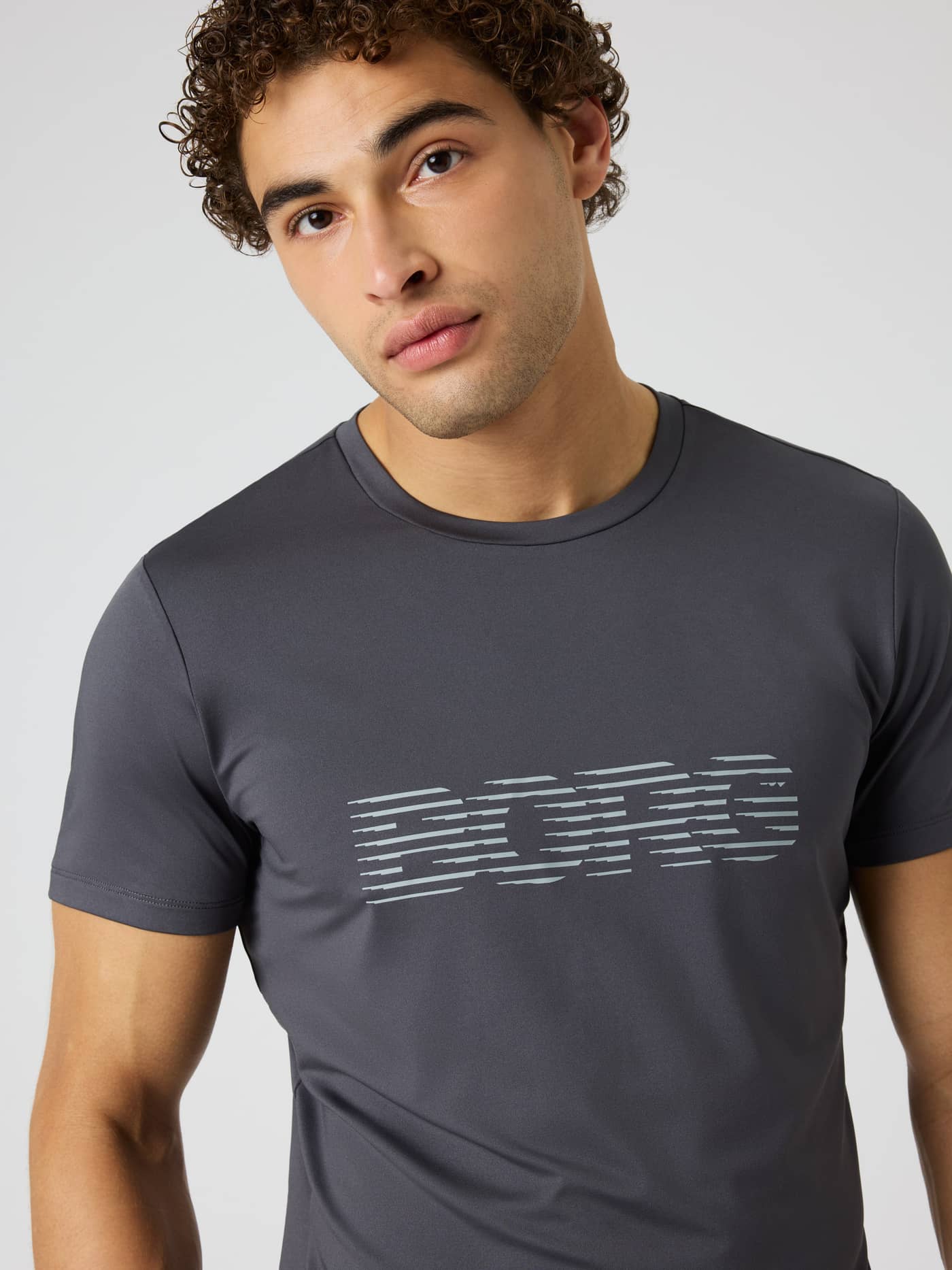 Front view of the Borg Graphic T-Shirt in Asphalt (Grey), a technical training tee featuring a grey chest graphic. - Image 4