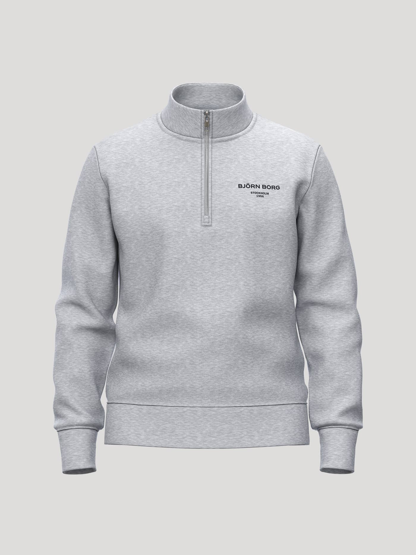 Front view of the Borg Essential 1 Half Zip in Light Grey Melange (Grey) with soft brushed fleece and a black chest logo. - Image 1