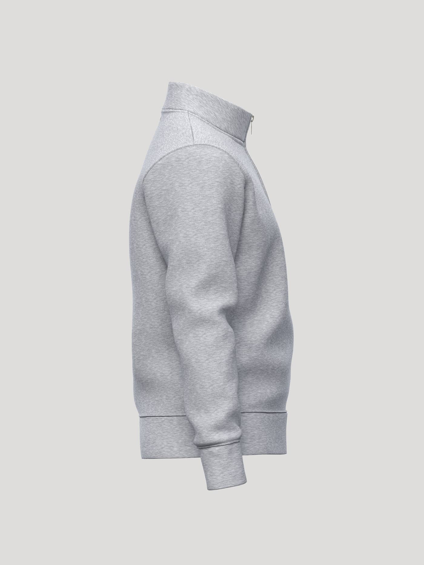Side view of the Borg Essential 1 Half Zip in Light Grey Melange (Grey) featuring a metal zipper and ribbed cuffs. - Image 4