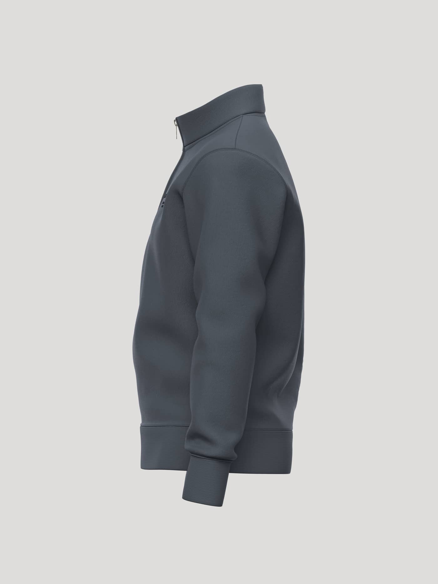 Side view of the Borg Essential 1 Half Zip in Turbulance (Grey) with half-zip front and ribbed cuffs for training. - Image 5