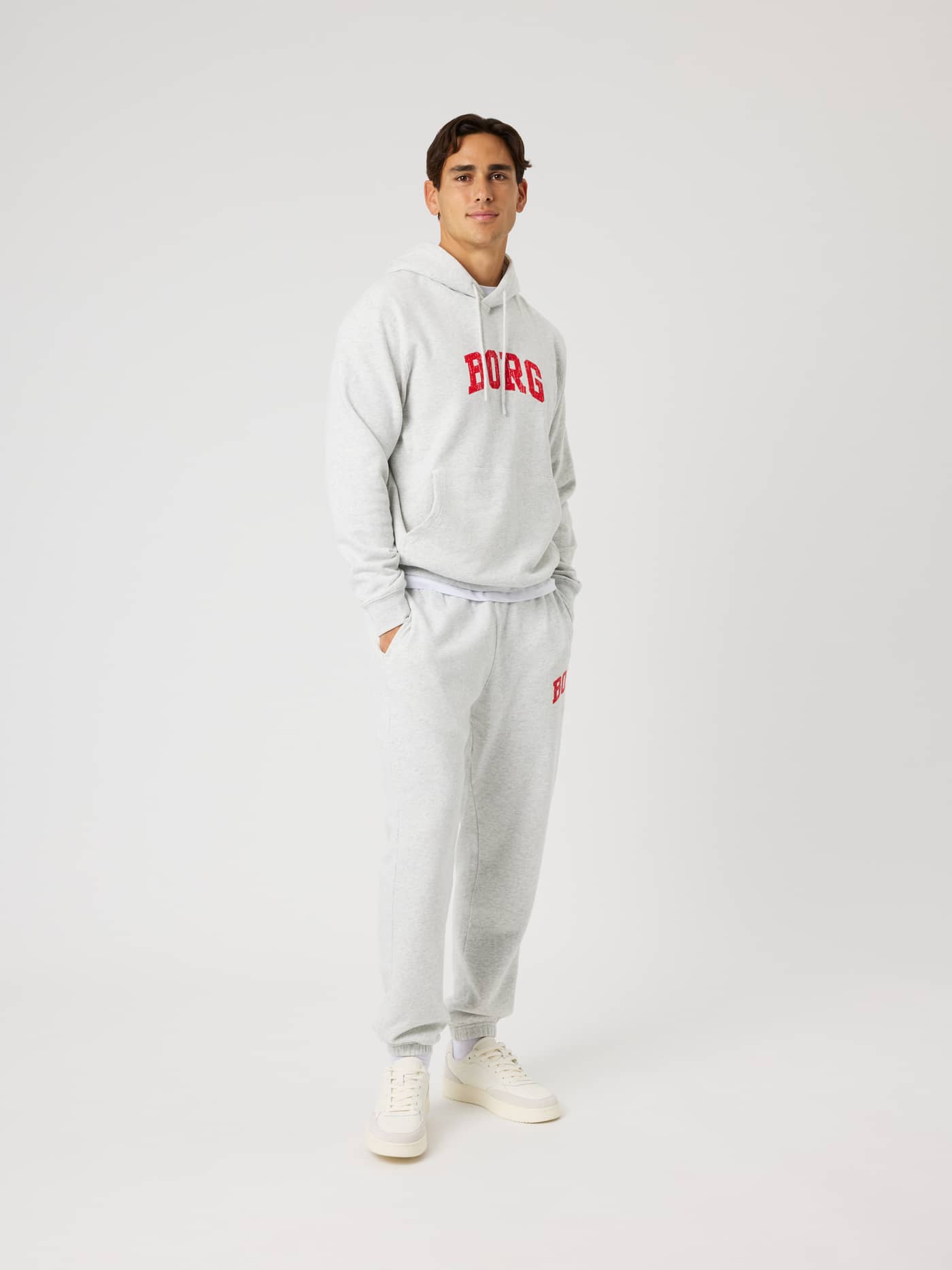 Borg Classic Print Hoodie in Ultra Light Grey Melange (Grey) with a red chest logo in a full-body view for training. - Image 3