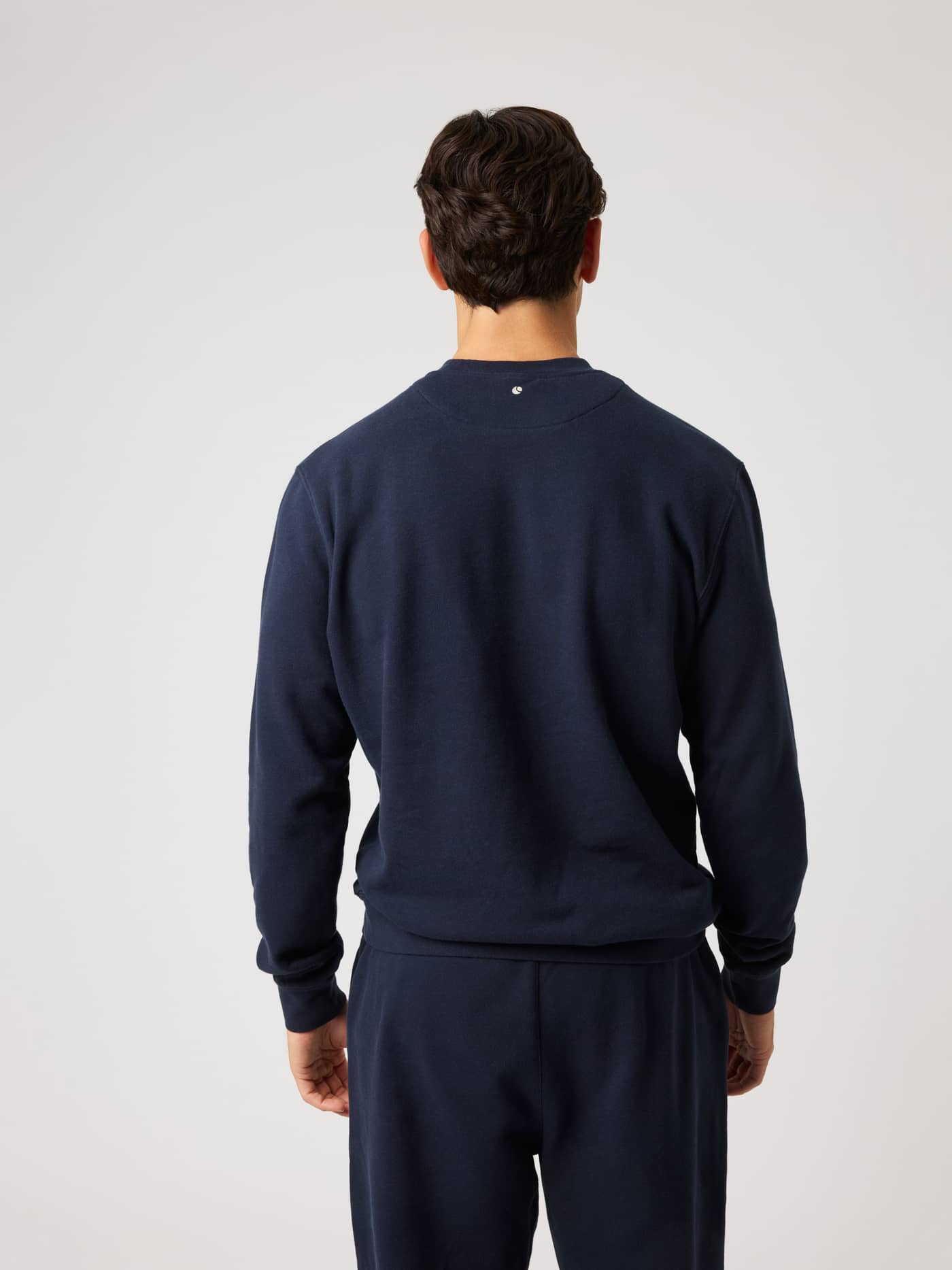 Back view of the Borg Classic Print Sweatshirt in Night sky (Navy) with a small tennis ball print at the neck. - Image 2