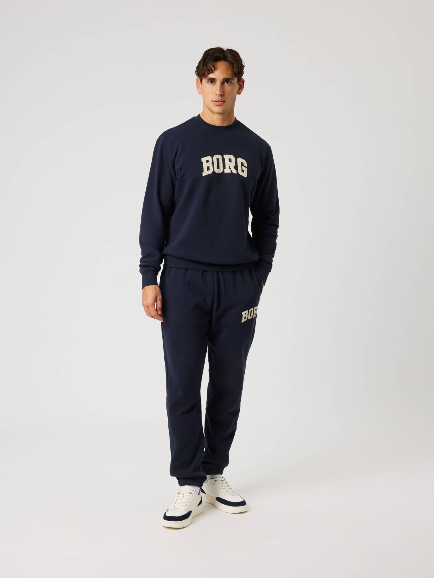 Full-body front view of the Borg Classic Print Sweatshirt in Night sky (Navy) with a cream logo and tennis-inspired style. - Image 3