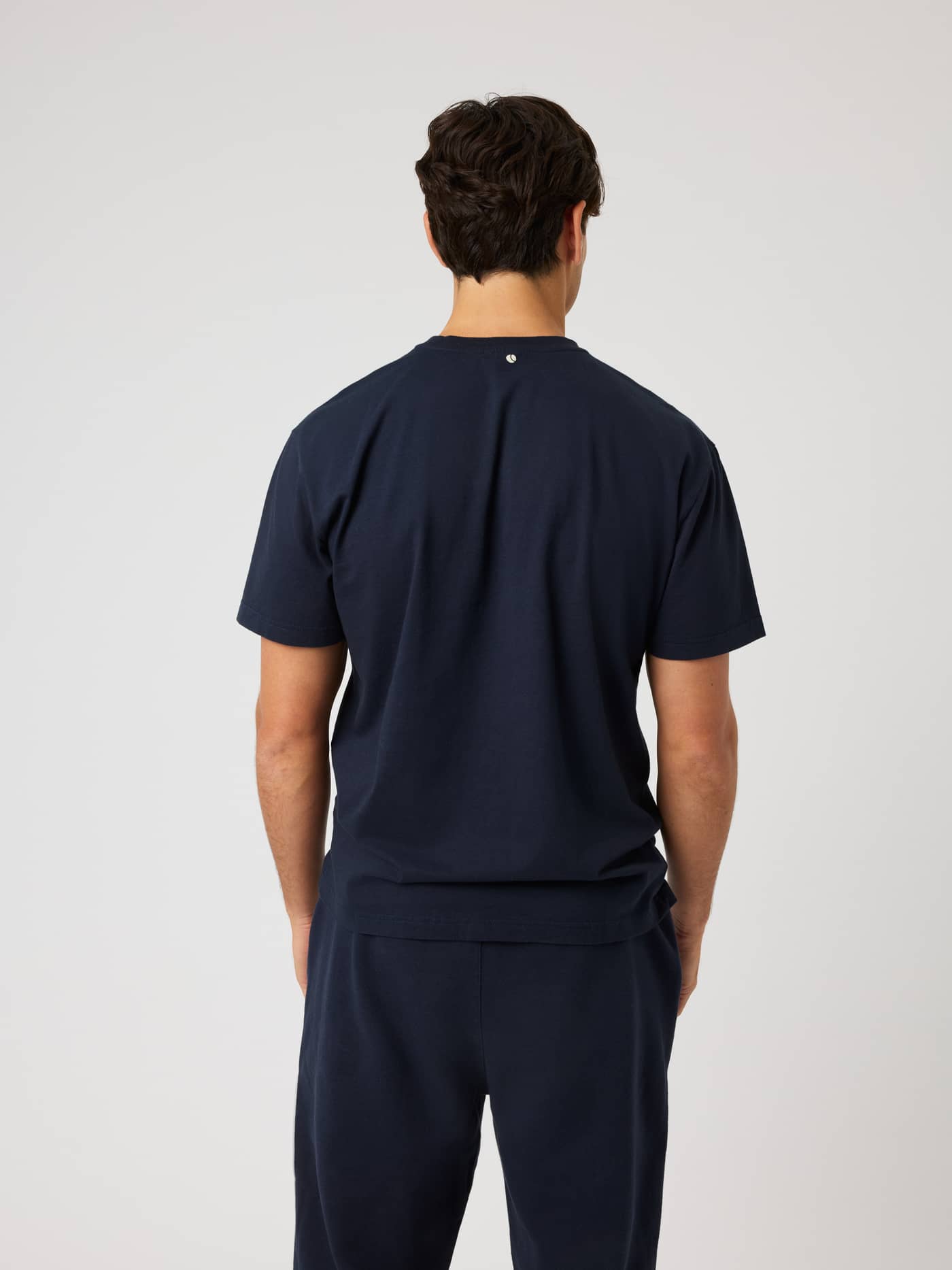 Back view of the Borg Classic Print T-Shirt in Night Sky (Navy) featuring a tennis ball print for training. - Image 2