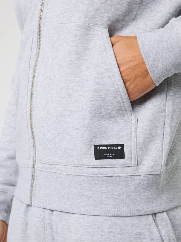 Centre Full Zip Sweatshirt in Light Grey Melange (Grey) featuring a front pocket and a black logo label. - Image 5
