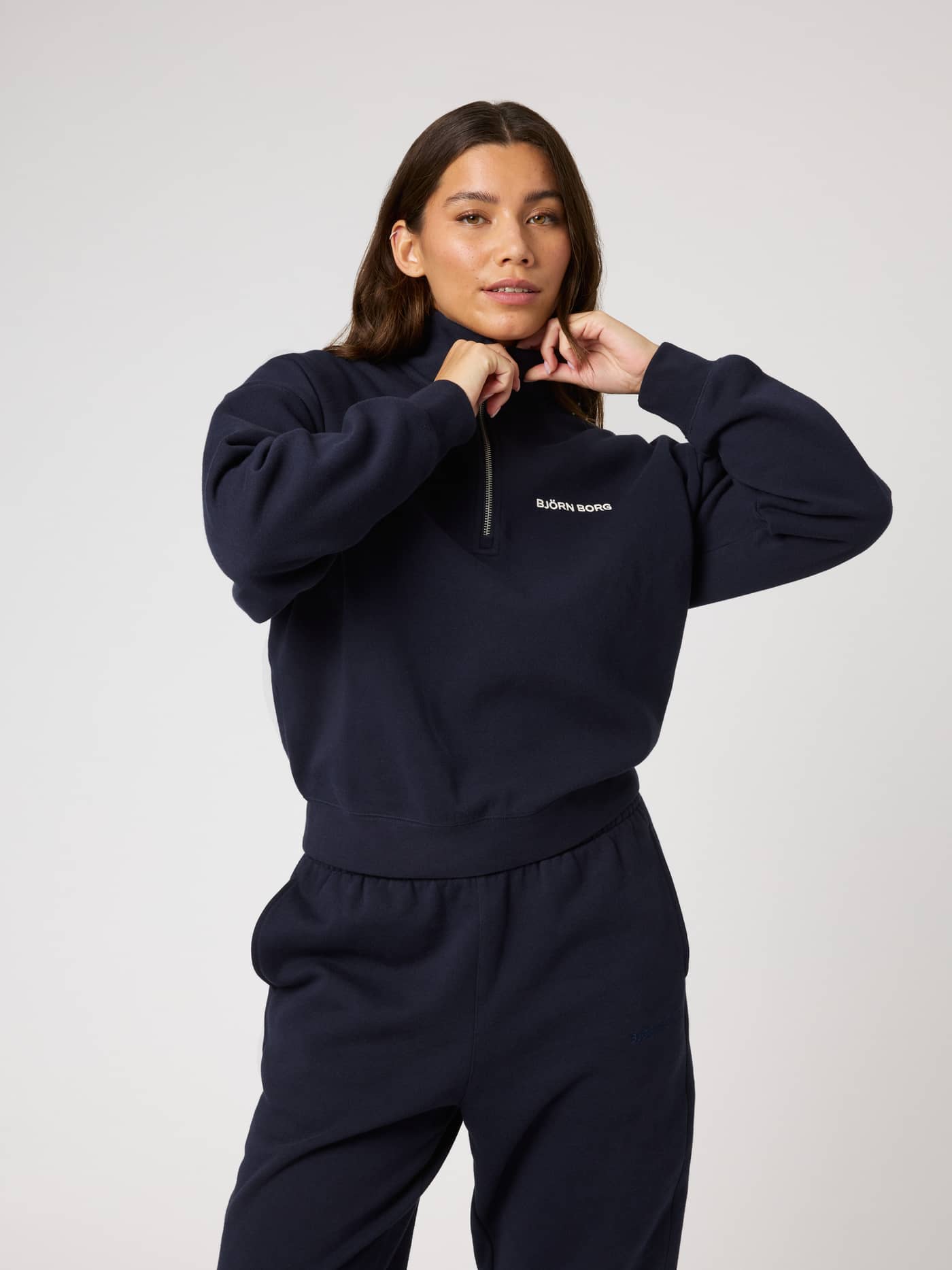 Front view of the Borg Halfzip Sweatshirt in Night sky (Navy) with a white chest logo and soft brushed fleece finish. - Image 3