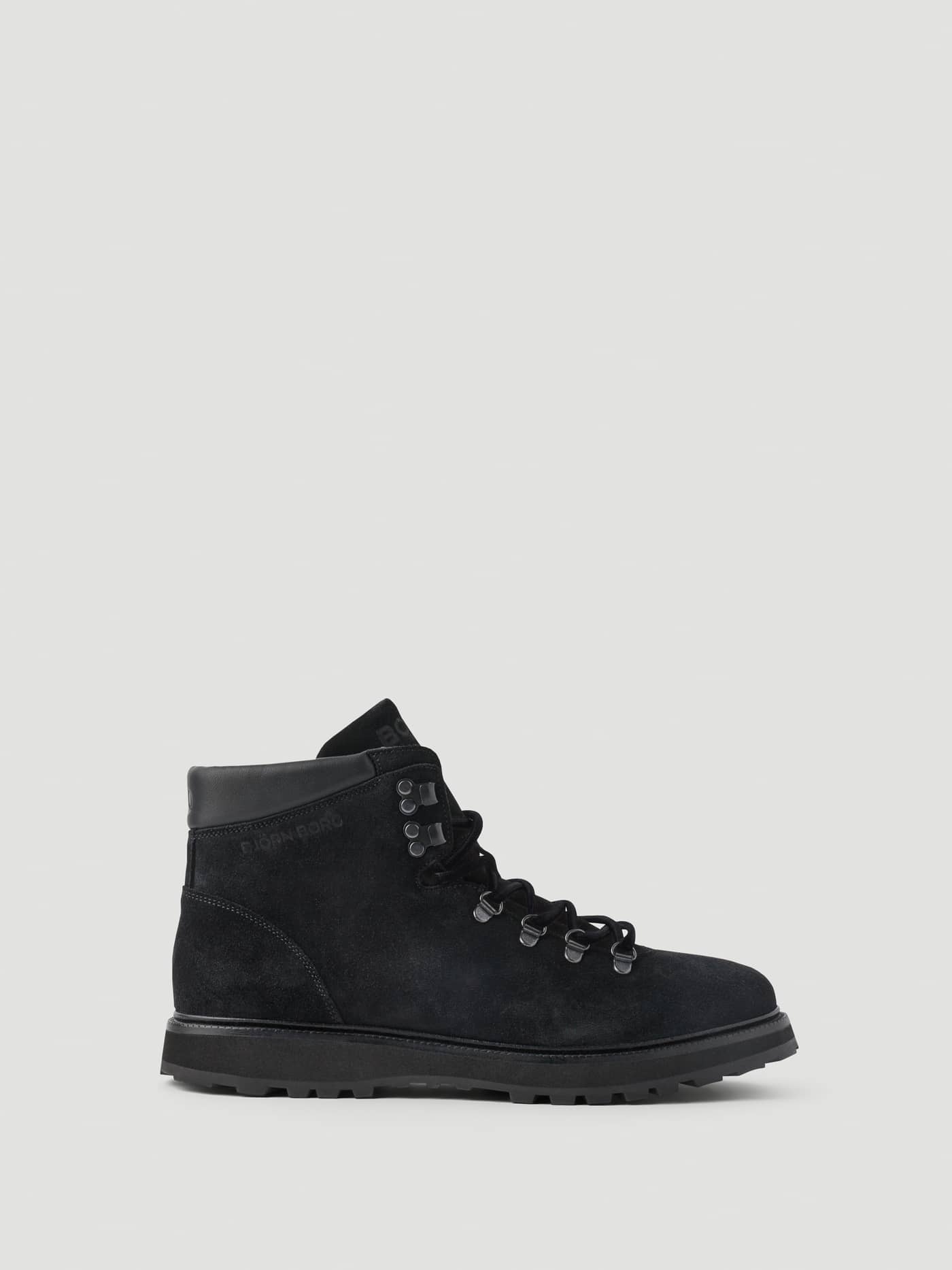 Men's Summit Boots in Black featuring a premium leather finish and rugged hiking-inspired design in a side profile. - Image 1