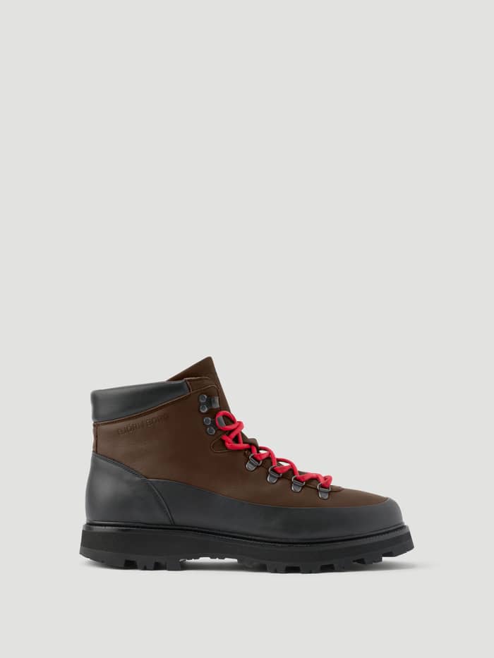 Side view of the leather Men's Summit Vibram Boots in Brown and Black featuring red laces and durable Vibram soles.