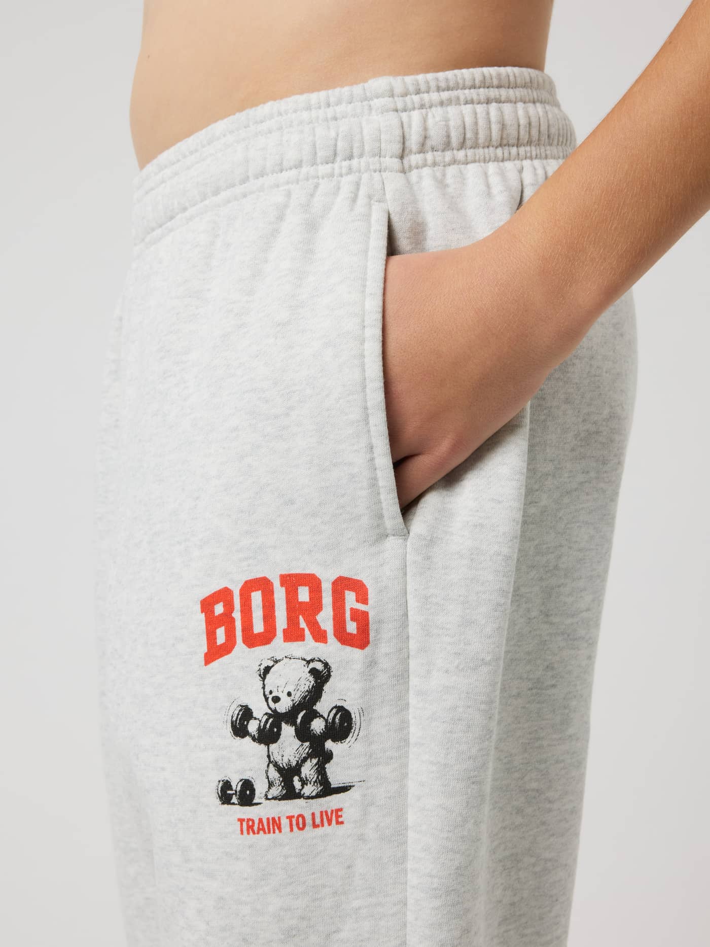 Kids' Borg Oversized Sweatpants in Ultra Light Grey Melange (Grey) featuring a red logo and tennis training bear graphic. - Image 4