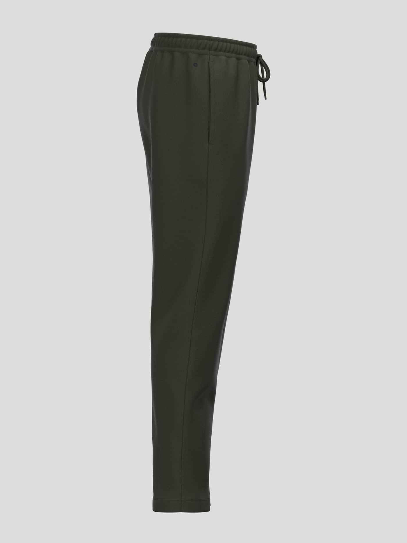 Side view of the Borg Essential 1 Sweatpants in Rosin (Green), featuring tapered legs and soft brushed fleece for tennis. - Image 4