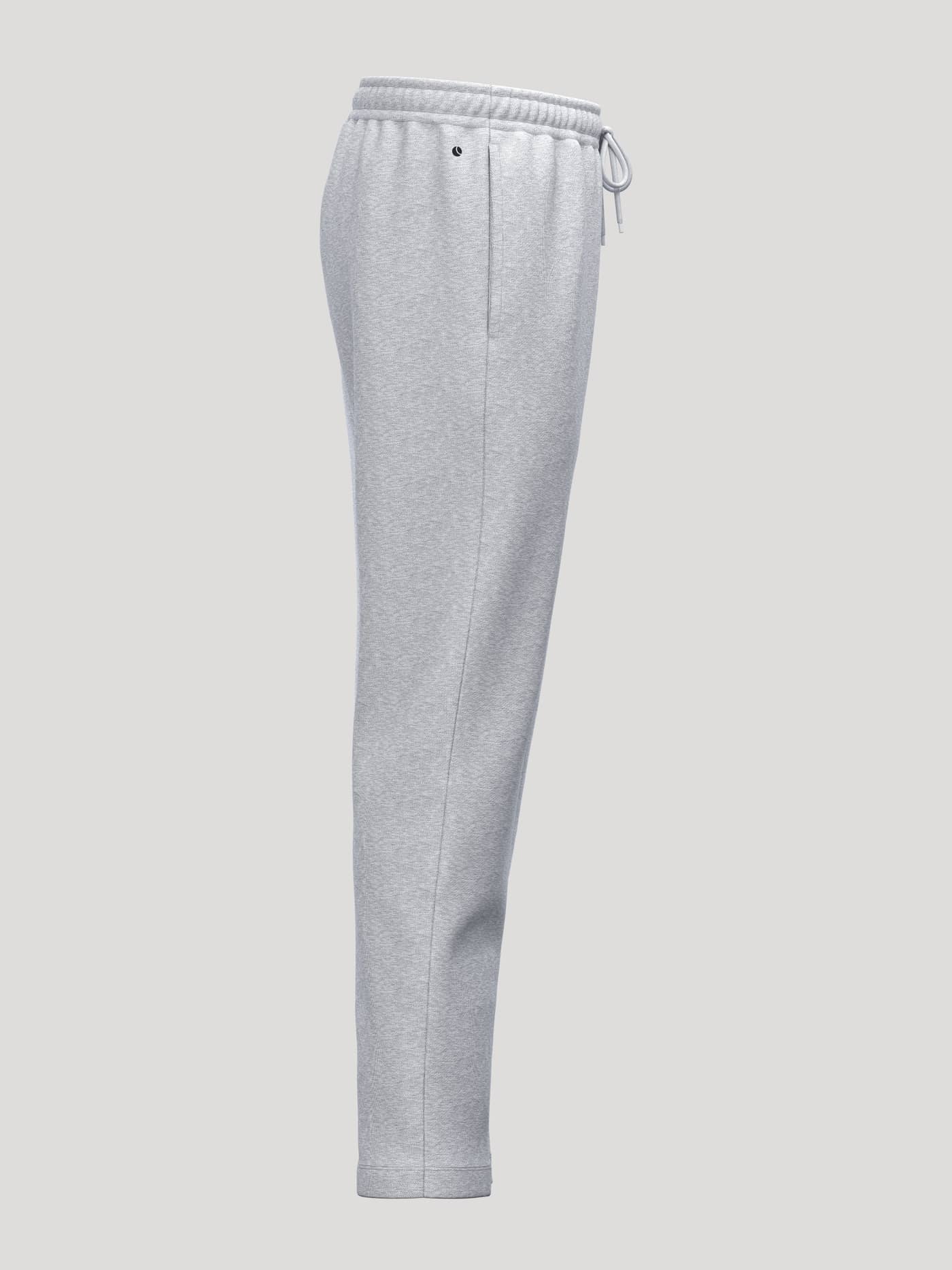 Side view of Borg Essential 1 Sweatpants in Light Grey Melange (Grey) featuring an adjustable drawstring waist. - Image 4