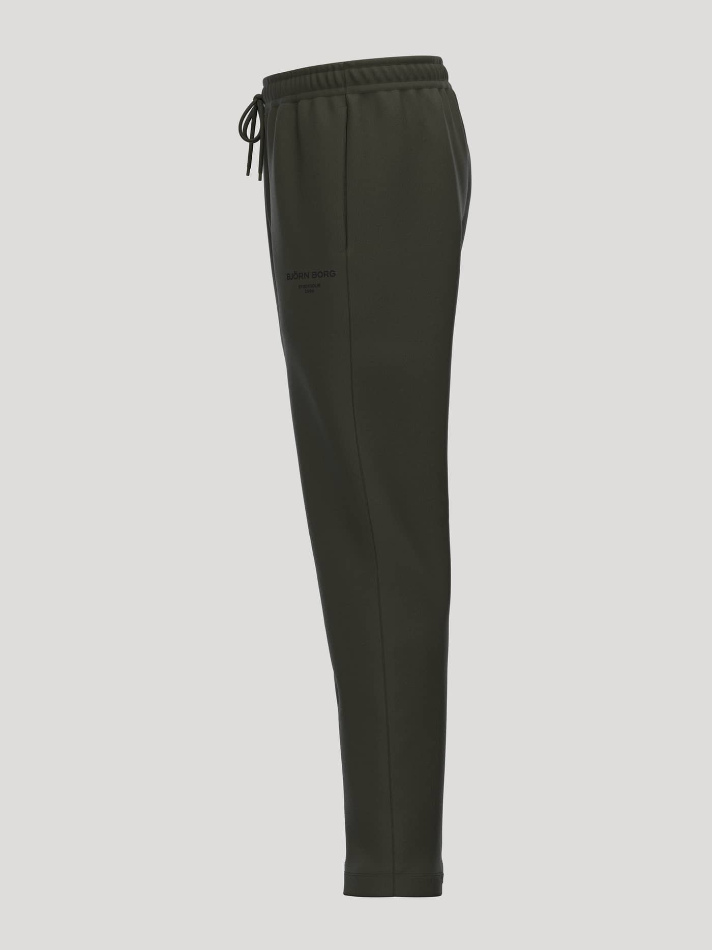 Borg Essential 1 Sweatpants in Rosin (Green) featuring a tapered leg, drawstring waist, and a black logo print. - Image 3