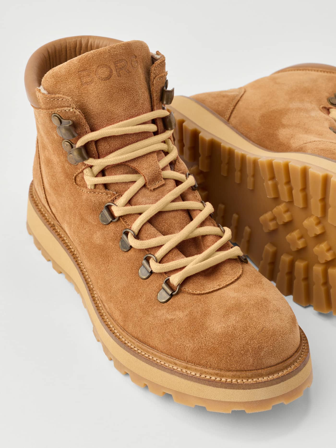 Women's Summit Boots in Brown leather featuring metallic eyelets, a tonal BORG logo, and a functional lugged sole. - Image 4