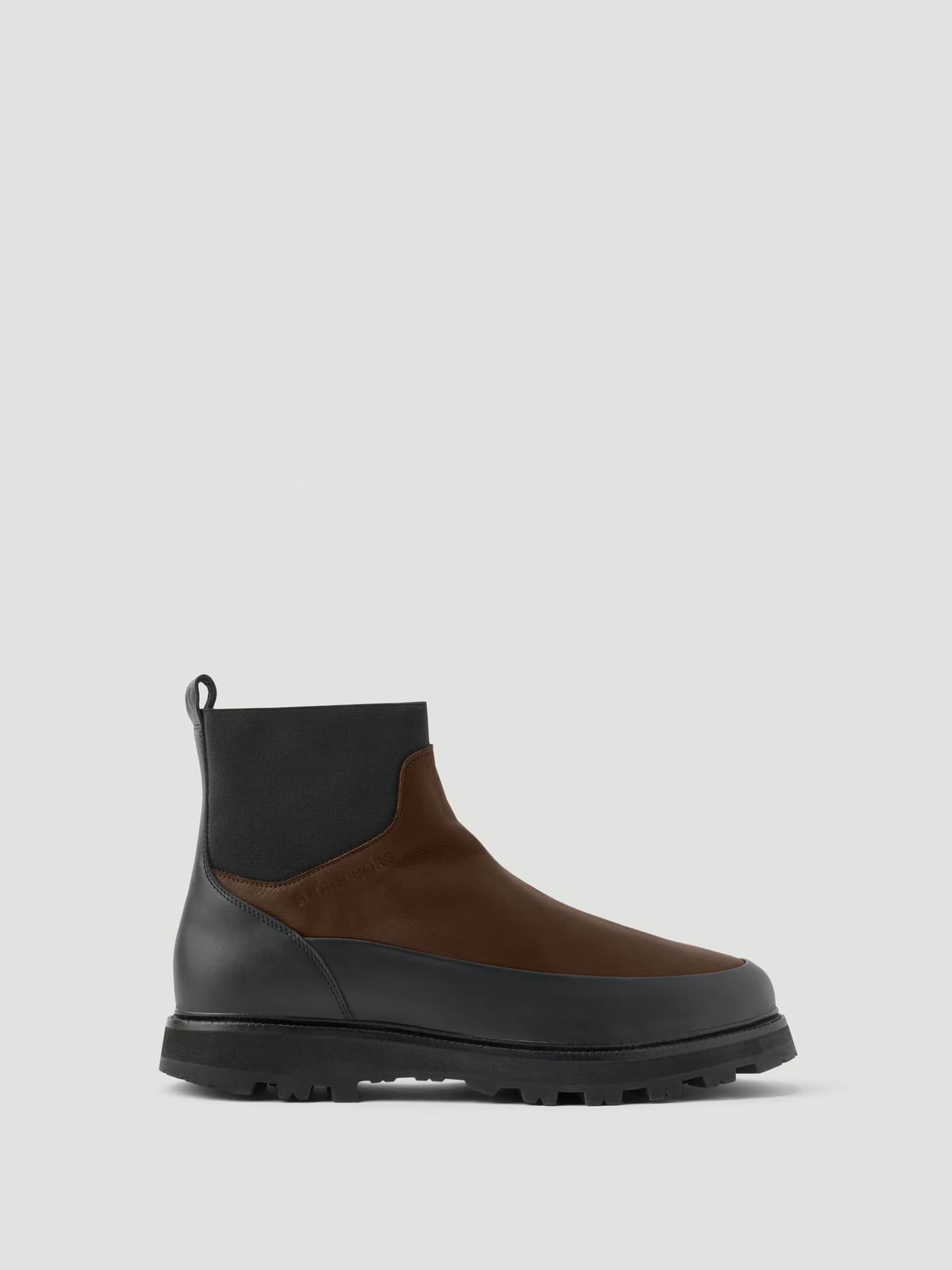Side view of the Men's Summit Chelsea Vibram Boots in Brown and Black with a premium leather upper and technical lug sole. - Image 1