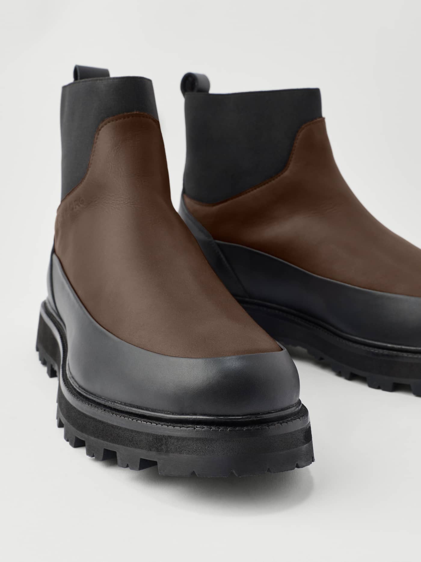 Men's Summit Chelsea Vibram Boots in brown and black leather with a thick lugged sole and technical design. - Image 5