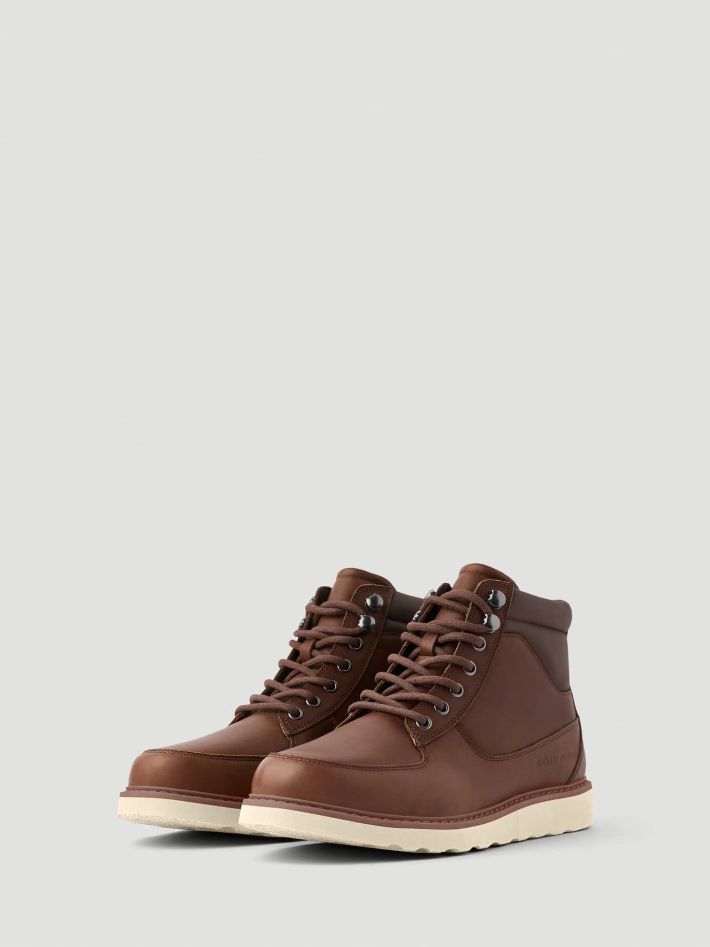 Side view of the Men's Altitude Boots in Brown leather featuring a lace-up front and a contrasting white sole. - Image 2