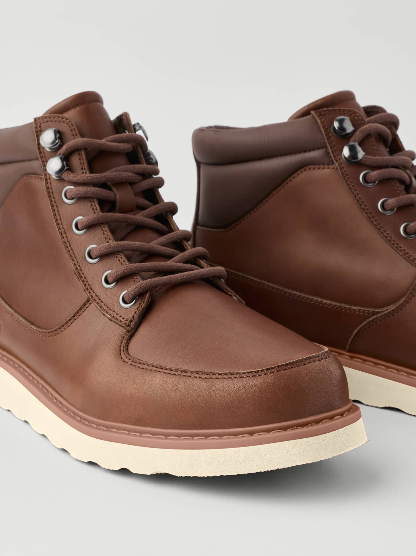 Men's Altitude Boots in Brown leather featuring a lace-up front, silver eyelets, and a contrasting off-white sole. - Image 4