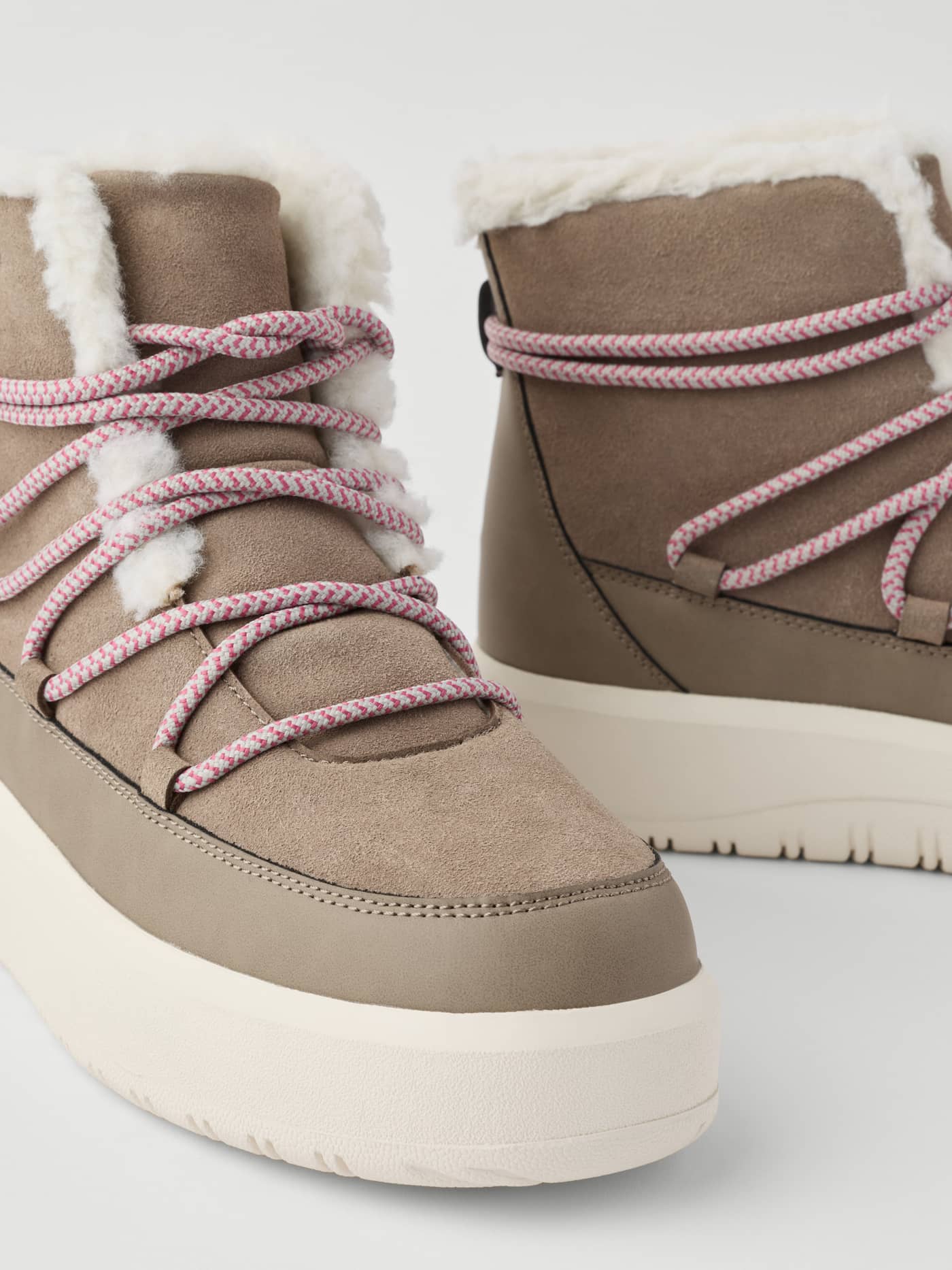 Women's Wooly Lace Up Boots in Brown featuring pink patterned laces, a thick sole, and soft faux fur lining. - Image 5