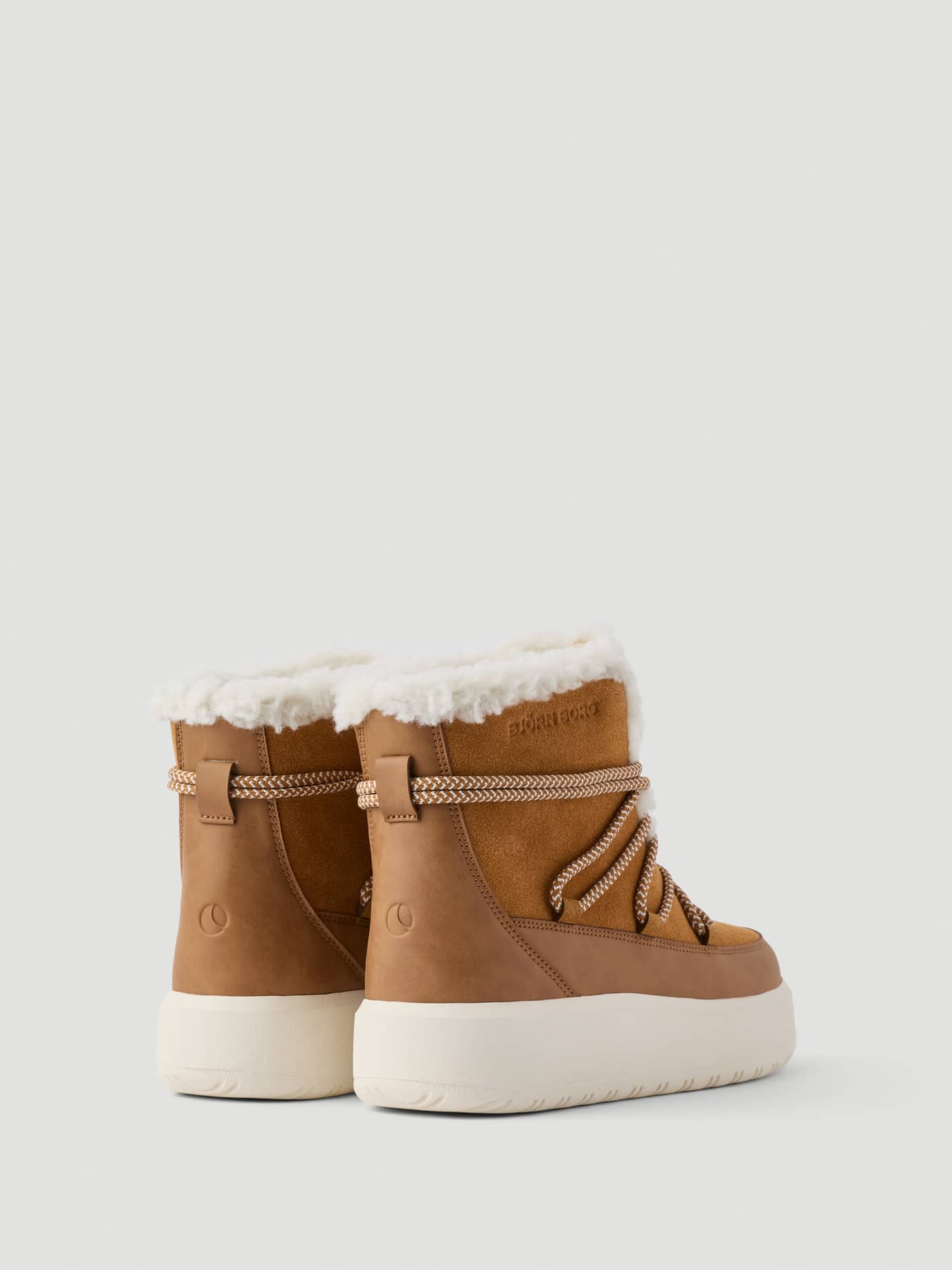 Women's Wooly Lace Up Boots in Brown featuring a cozy fluffy lining, tonal logo, and a durable platform sole. - Image 4