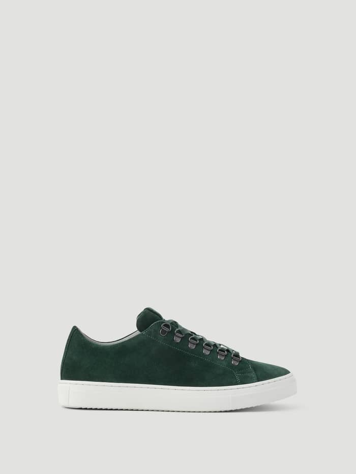 Men's Classic Suede D-Ring Sneakers in Green, a tennis-inspired suede shoe with metallic D-ring eyelets and a white outsole.