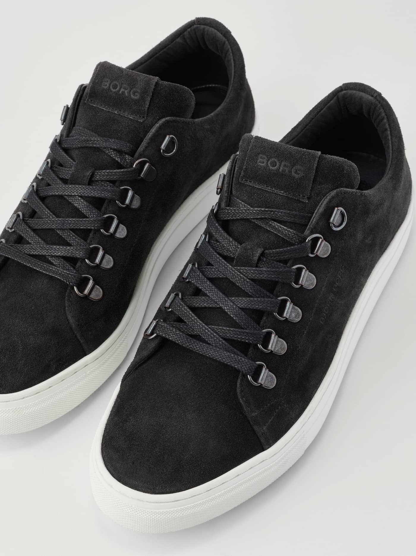 Men's Classic Suede D-Ring Sneakers in Black featuring tonal logos, a tennis-inspired design, and contrast white soles. - Image 4