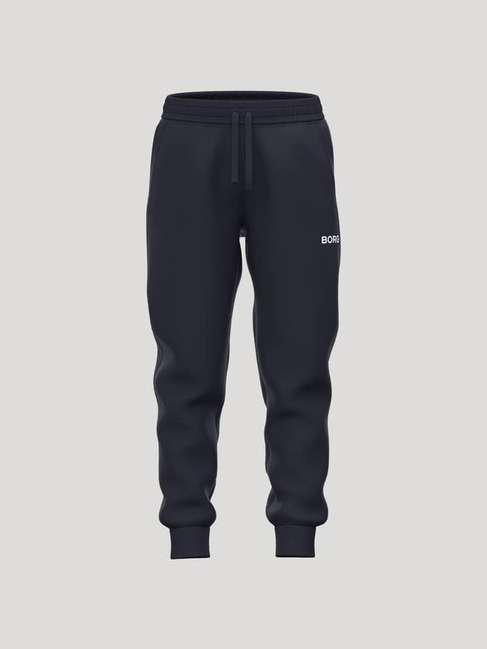 Borg Essential 3 Tapered Sweatpants för barn i Night sky (Marinblå) med vit BORG-logo på benet, perfekt för tennis.
