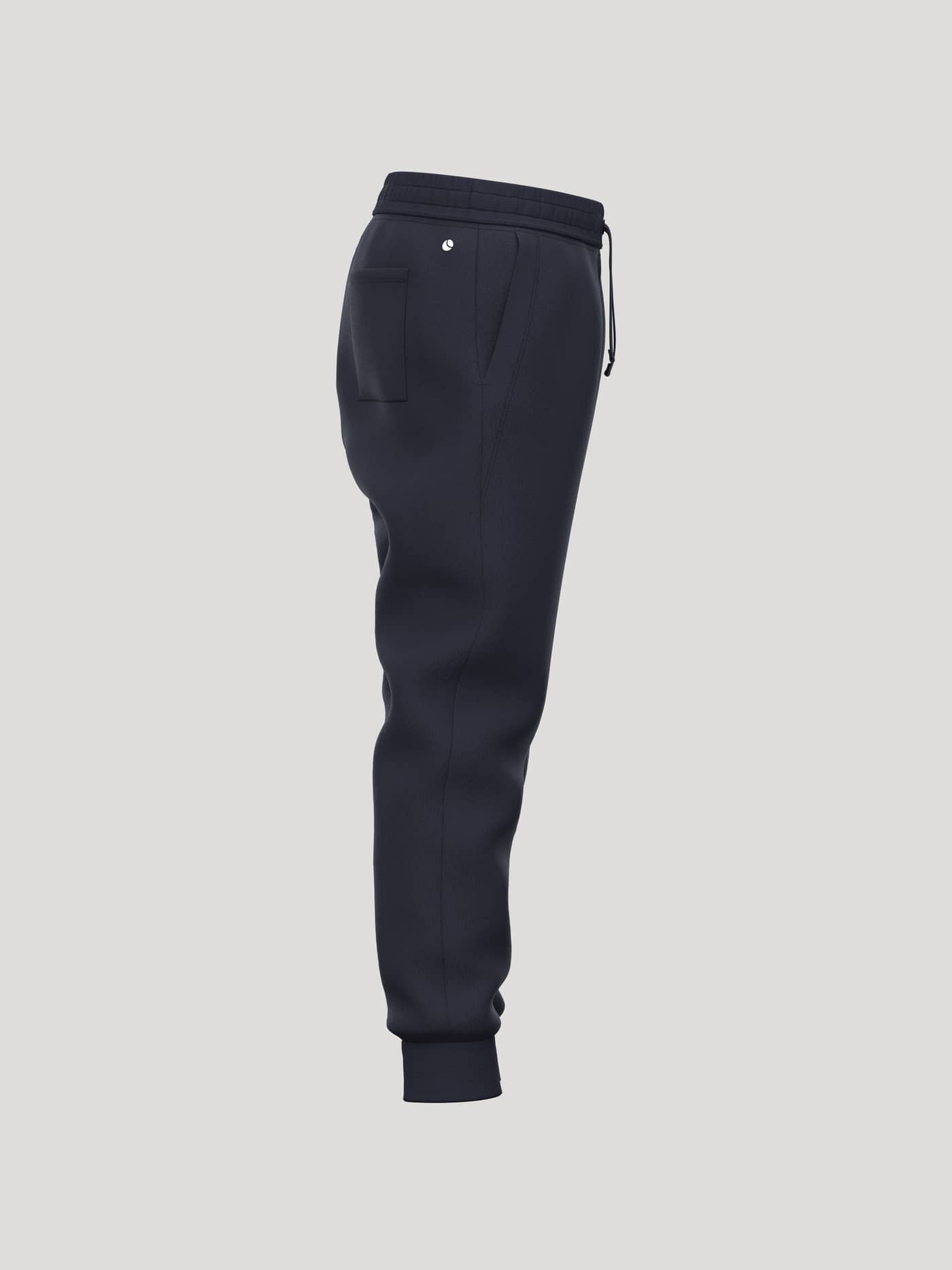 Side view of kids Borg Essential 3 Tapered Sweatpants in Night sky (Navy) featuring a white tennis ball logo. - Image 4