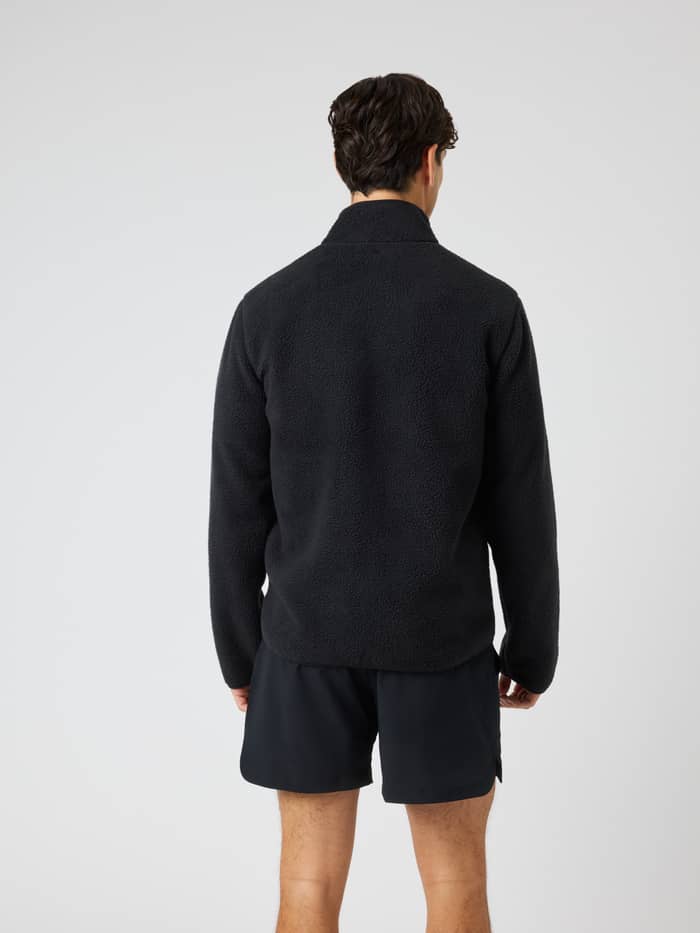 Back view of the Borg Pile Jacket in Black Beauty (Black), a recycled pile fleece ideal for training and tennis. - Image 2
