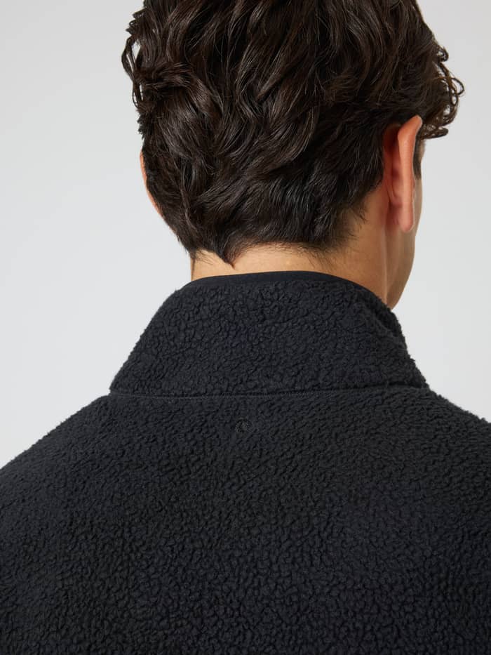 Back neck view of the Borg Pile Jacket in Black Beauty (Black) featuring tennis ball embroidery and pile fleece texture. - Image 4